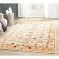 Handmade Tribal Ivory/ Gold Wool Rug (8' x 10')