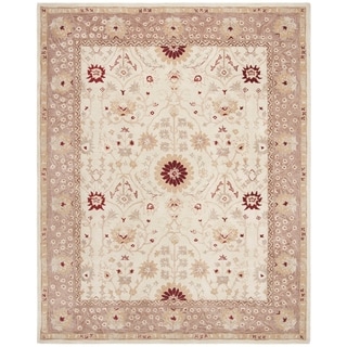 Handmade Timeless Ivory/ Sand Wool Rug (9' x 12')