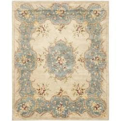 Handmade Ivory/ Light Blue Hand-spun Wool Rug (8' x 10')
