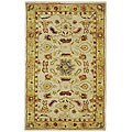 Handmade Tribal Ivory/ Gold Wool Rug (4' x 6')