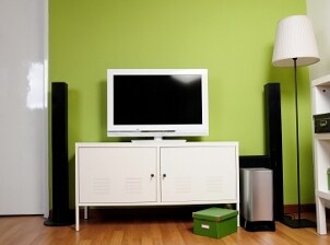 Small cheap TV in a cozy apartment