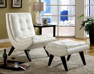 Modern white leather chair with matching ottoman