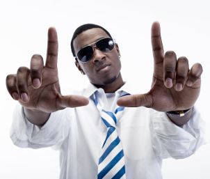 Man in sunglasses strikes a cool pose