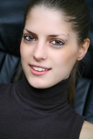 A pretty model with an eyebrow piercing