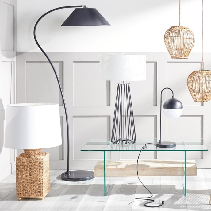 A showcase of unique lamps made from metal and wicker with a contemporary aesthetic available online at Overstock